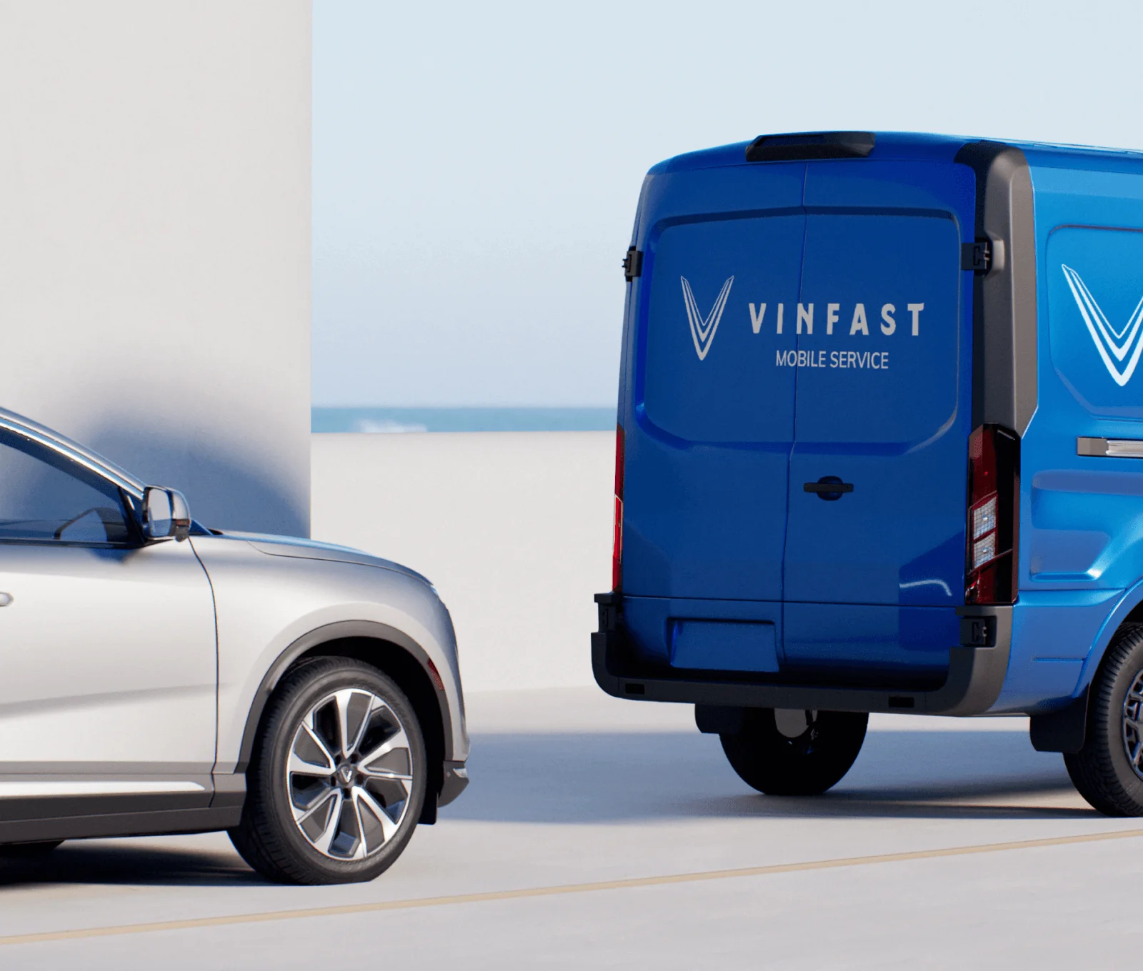 Silver VinFast car and the mobile service van driving on the road to promote the VinFast warranty